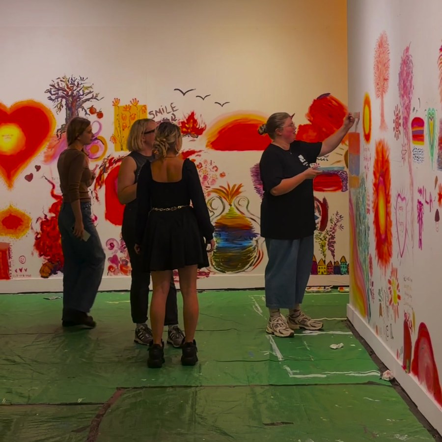 People painting a shared mural together at Make Your Mark, ArtHouse Jersey